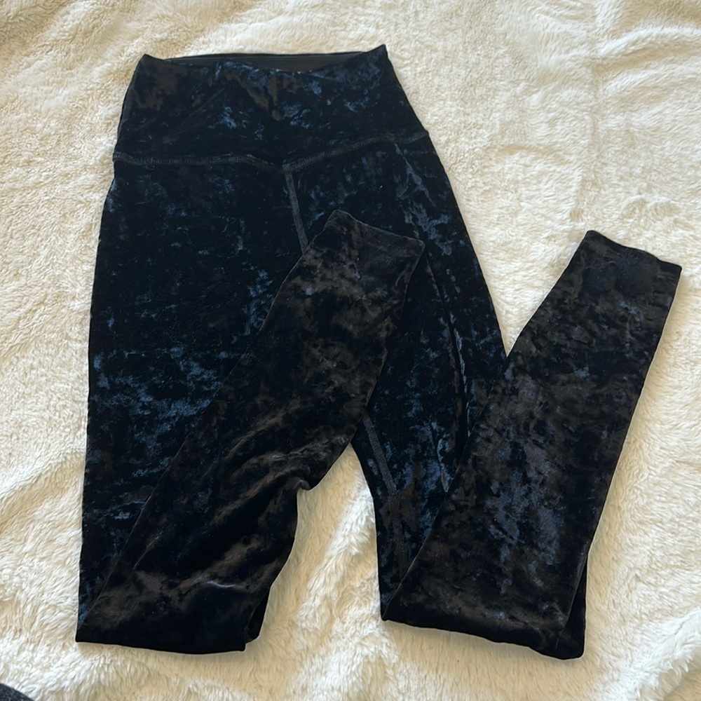 Brand new without tags beyond yoga leggings. They are black velvet.